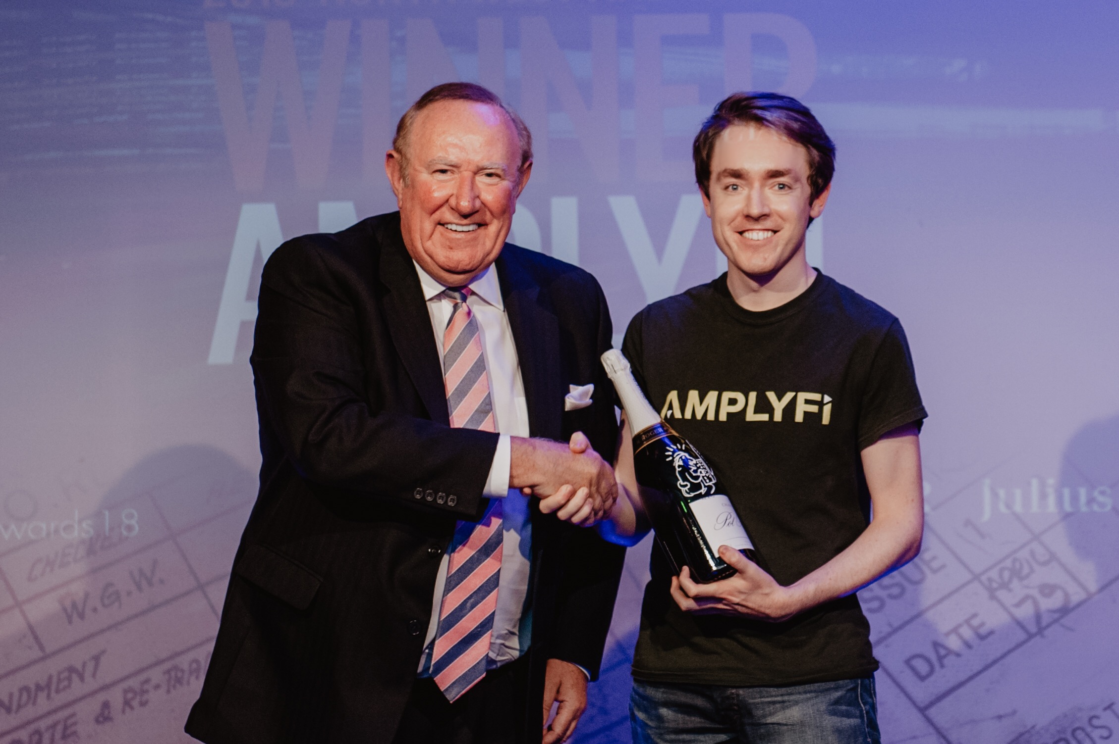 Daniel James receiving The Spectator Economic Disruptor of the Year Award from Andrew Neil